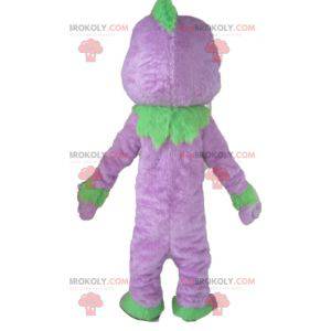 Mascotte de monstre violet et vert de marionnette -