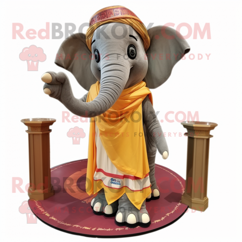 Tan Elephant mascot costume character dressed with a Evening Gown and Scarves