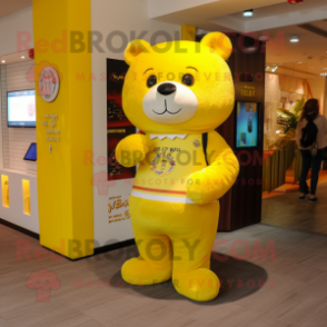 Lemon Yellow Bear mascot costume character dressed with a Flare Jeans and Wallets