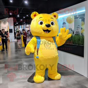 Lemon Yellow Bear mascot costume character dressed with a Flare Jeans and Wallets