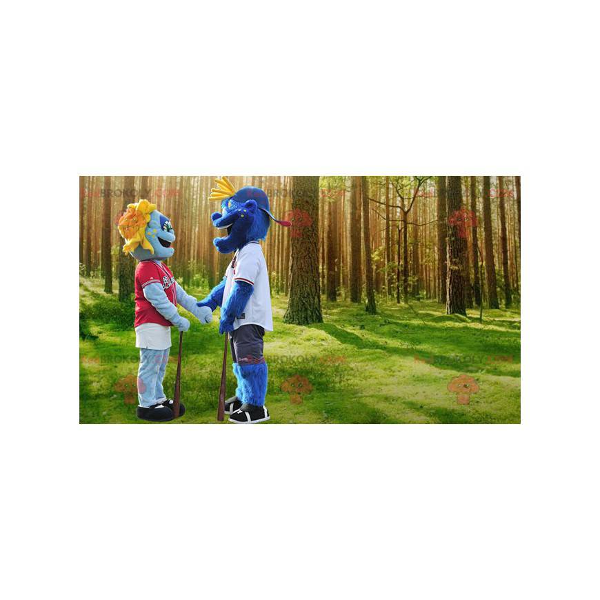 2 blaue Schneemannmaskottchen in Sportbekleidung - 2 blaue Schneemannmaskottchen in Sportbekleidung -
