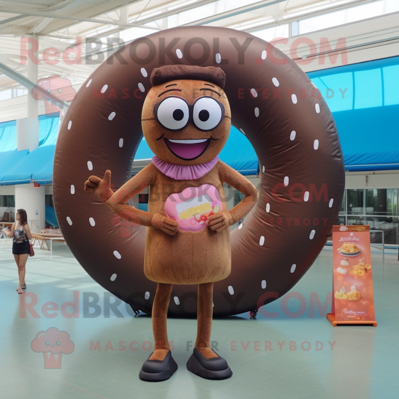 Brown Donut mascot costume character dressed with a Bikini and Reading glasses Brown Donut mascot costume character dressed with a Bikini and Reading glasses