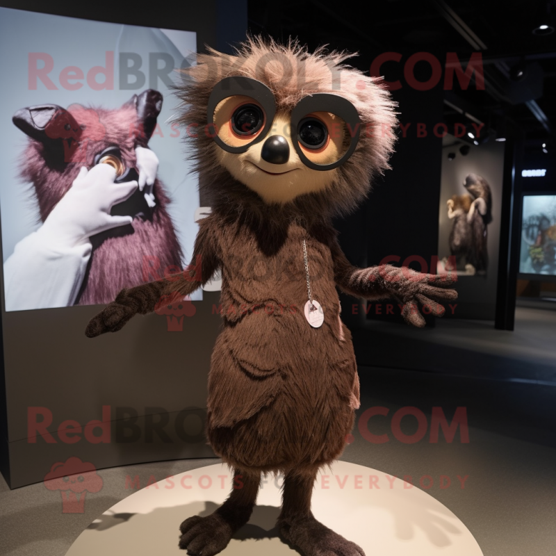 Brown Aye-Aye mascot costume character dressed with a Mini Dress and Eyeglasses