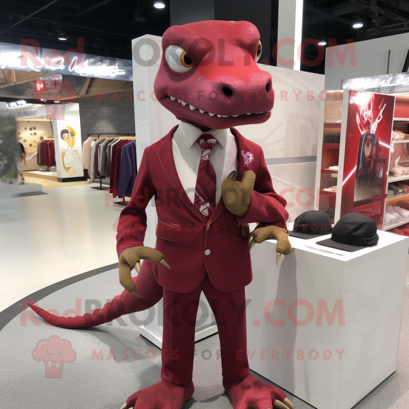 Maroon Lizard mascot costume character dressed with a Suit and Keychains