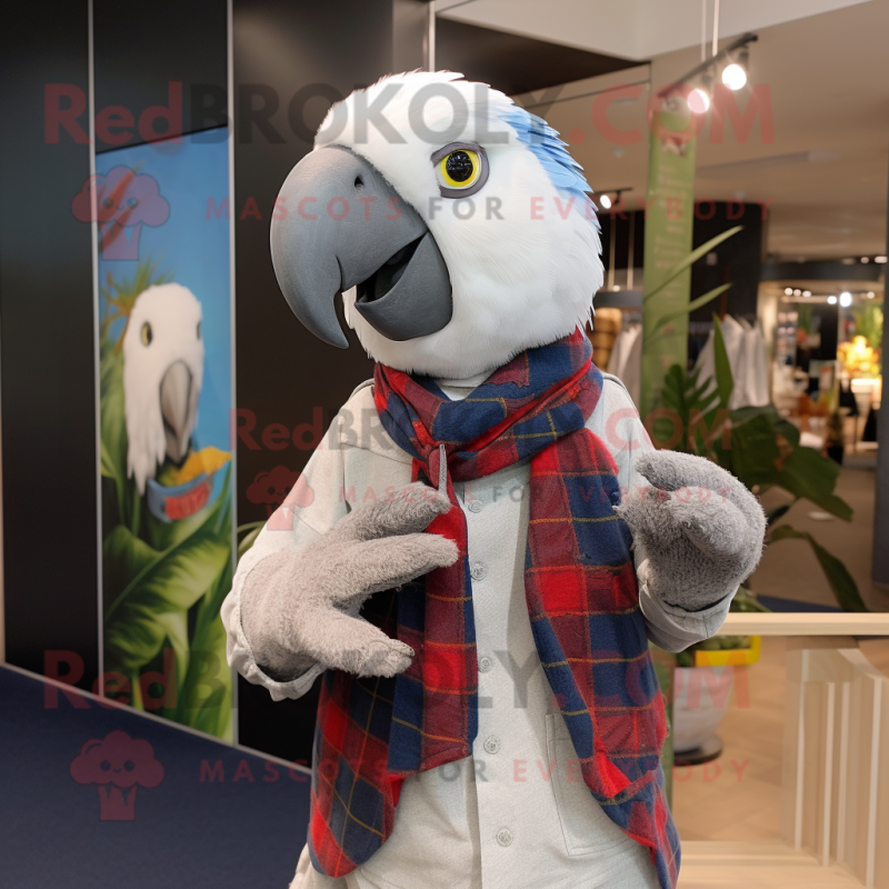 Silver Parrot mascot costume character dressed with a Flannel Shirt and Keychains