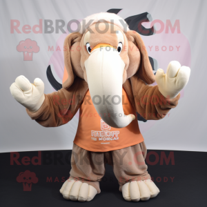Peach Mammoth mascot costume character dressed with a Sweatshirt and Scarves