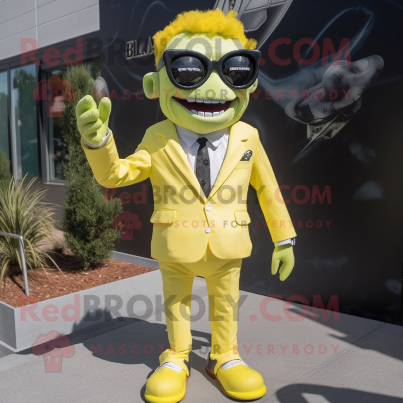 Lemon Yellow Frankenstein mascot costume character dressed with a Suit Jacket and Sunglasses