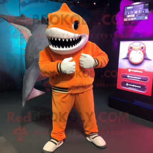 Orange Megalodon mascot costume character dressed with a Long Sleeve Tee and Digital watches