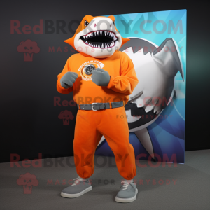 Orange Megalodon mascot costume character dressed with a Long Sleeve Tee and Digital watches