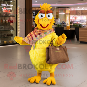 Yellow Tandoori Chicken mascot costume character dressed with a Sweater and Clutch bags