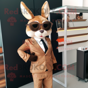 Brown Rabbit mascot costume character dressed with a Suit and Sunglasses