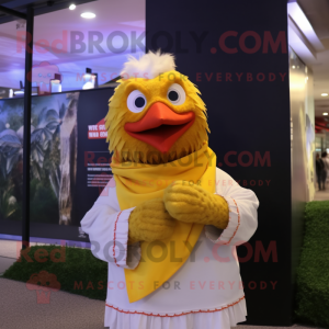 Gold Chicken mascot costume character dressed with a Button-Up Shirt and Scarf clips