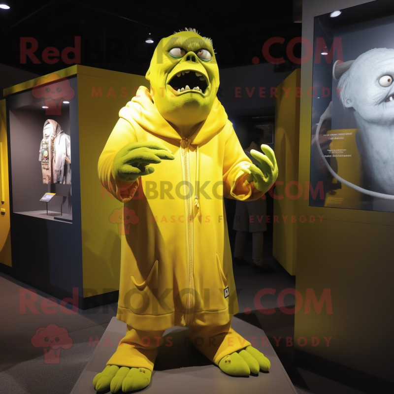 Lemon Yellow Frankenstein mascot costume character dressed with a Cover-up and Brooches Lemon Yellow Frankenstein mascot costume character dressed with a Cover-up and Brooches