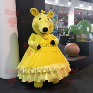 Lemon Yellow Tapir mascot costume character dressed with a Ball Gown and Hair clips