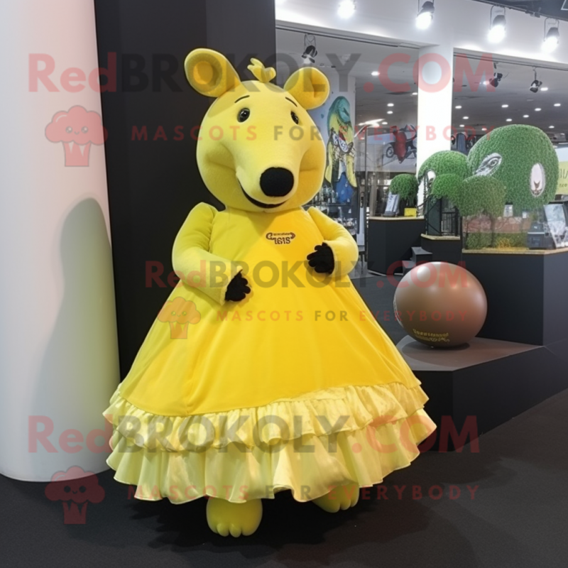 Lemon Yellow Tapir mascot costume character dressed with a Ball Gown and Hair clips Lemon Yellow Tapir mascot costume character dressed with a Ball Gown and Hair clips
