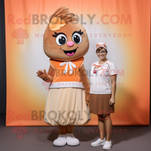 Tan Apricot mascot costume character dressed with a Wrap Skirt and Headbands