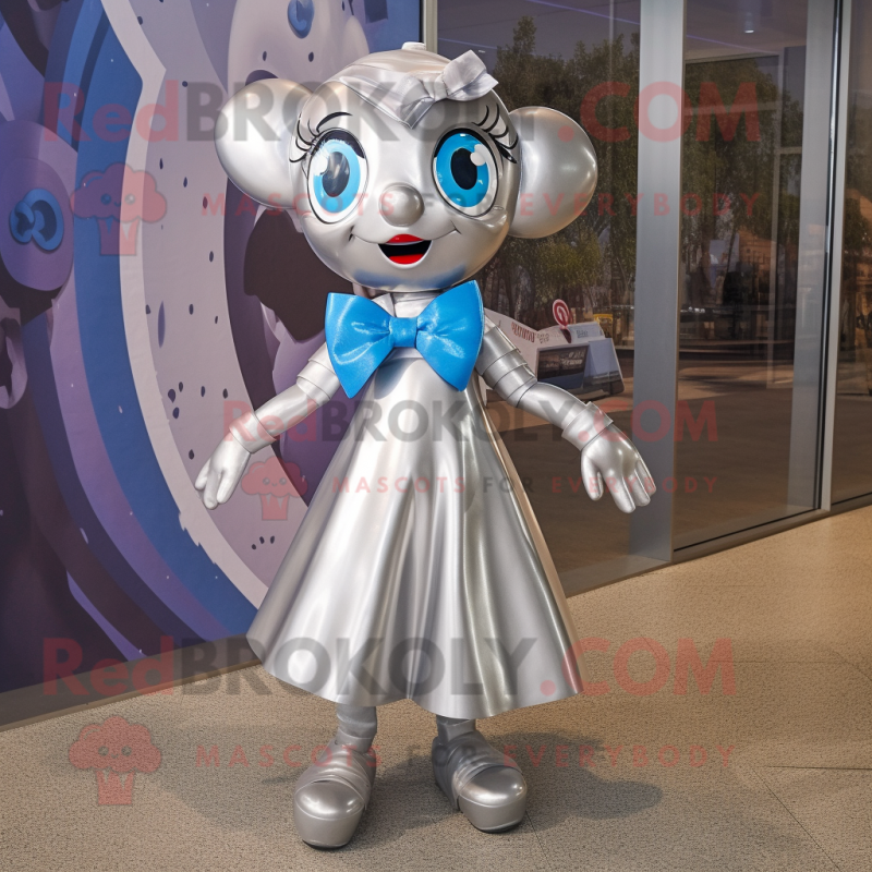 Silver Gyro mascot costume character dressed with a Shift Dress and Bow ties Silver Gyro mascot costume character dressed with a Shift Dress and Bow ties