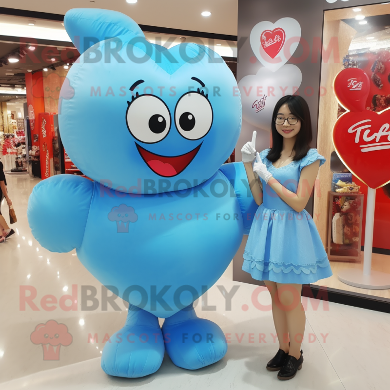 Sky Blue Heart mascot costume character dressed with a Mini Dress and Watches Sky Blue Heart mascot costume character dressed with a Mini Dress and Watches