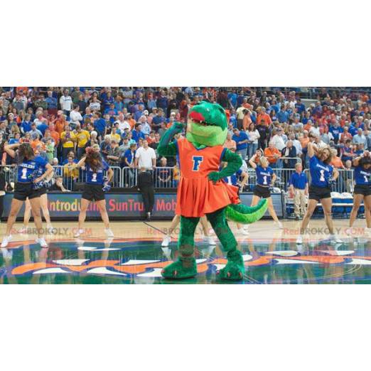 Mascote crocodilo verde em vestido vermelho - Redbrokoly.com