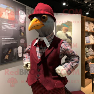 Maroon Guinea Fowl mascot costume character dressed with a Oxford Shirt and Berets