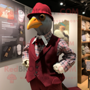 Maroon Guinea Fowl mascot costume character dressed with a Oxford Shirt and Berets