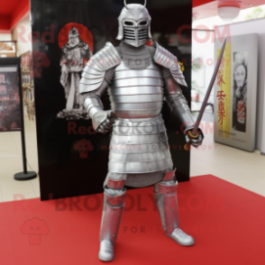 Silver Samurai mascot costume character dressed with a Suit and Foot pads