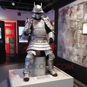 Silver Samurai mascot costume character dressed with a Suit and Foot pads