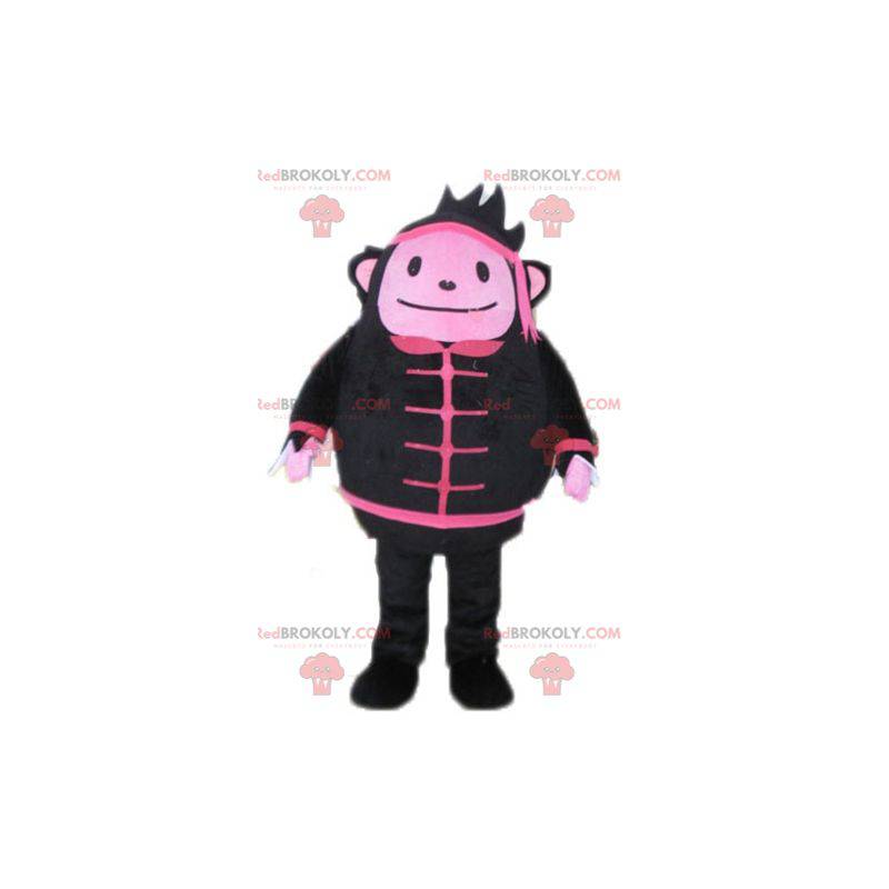 Mascotte de bonhomme de singe noir et rose - Redbrokoly.com