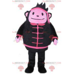 Mascotte de bonhomme de singe noir et rose - Redbrokoly.com