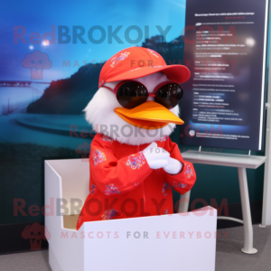 Red Muscovy Duck mascot costume character dressed with a Cover-up and Sunglasses