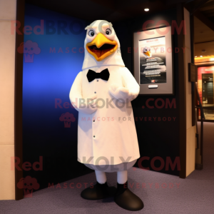Cream Seagull mascot costume character dressed with a Tuxedo and Belts