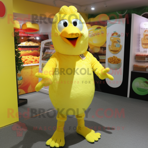 Lemon Yellow Turkey mascot costume character dressed with a T-Shirt and Cummerbunds