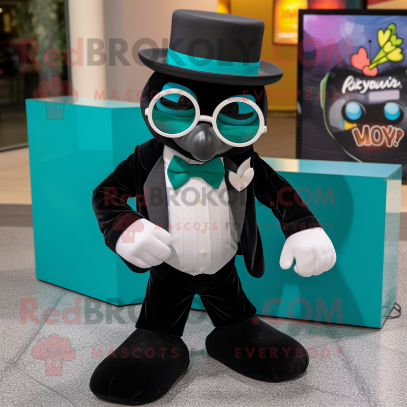 Teal Heart mascot costume character dressed with a Tuxedo and Sunglasses Teal Heart mascot costume character dressed with a Tuxedo and Sunglasses