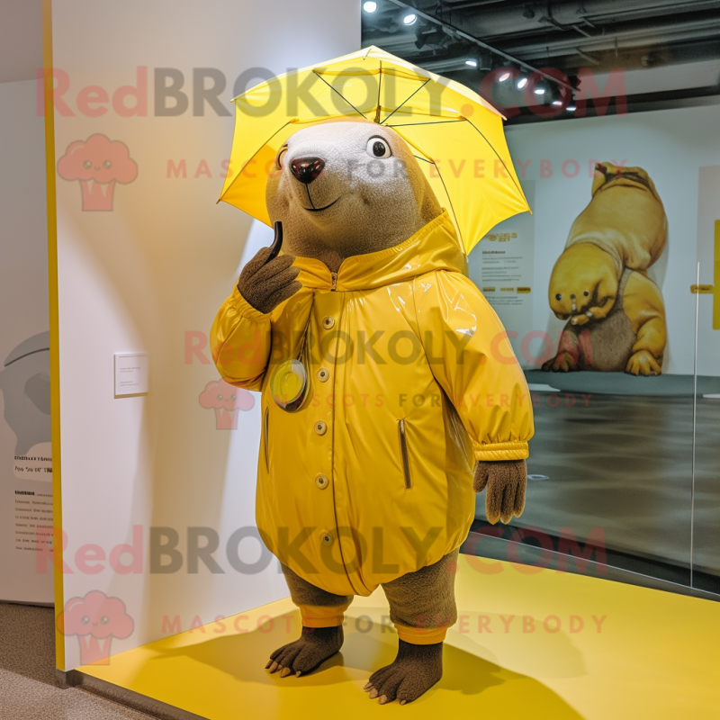 Yellow Glyptodon mascot costume character dressed with a Raincoat and Brooches Yellow Glyptodon mascot costume character dressed with a Raincoat and Brooches
