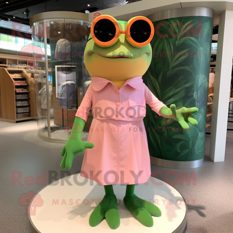Peach Frog mascot costume character dressed with a Dress and Sunglasses
