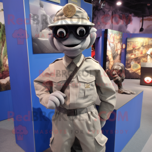 Gray Para Commando mascot costume character dressed with a Oxford Shirt and Suspenders