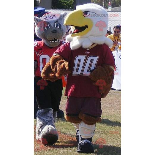 2 mascots a brown and white eagle and a gray wolf -