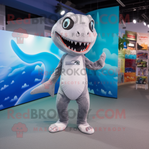 Silver Barracuda mascot costume character dressed with a Bodysuit and Clutch bags