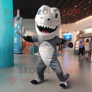 Silver Barracuda mascot costume character dressed with a Bodysuit and Clutch bags