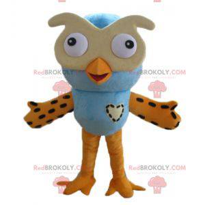 Mascote grande coruja azul e laranja com óculos - Redbrokoly.com