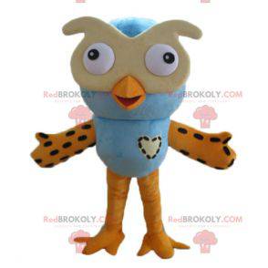 Big blue and orange owl mascot with glasses - Redbrokoly.com
