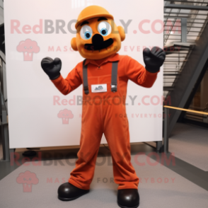 Rust Juggle mascot costume character dressed with a Jumpsuit and Suspenders