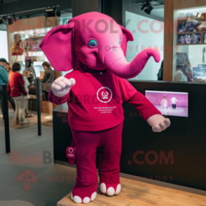 Magenta Elephant mascot costume character dressed with a Henley Tee and Smartwatches