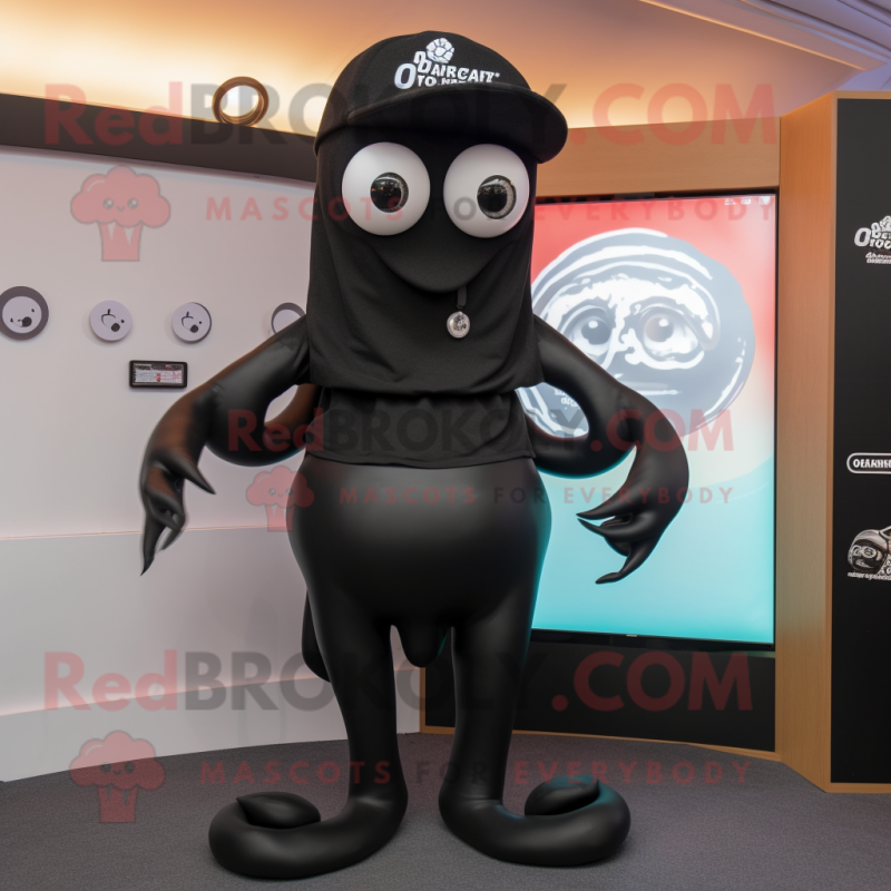 Black Squid mascot costume character dressed with a Oxford Shirt and Rings Black Squid mascot costume character dressed with a Oxford Shirt and Rings