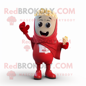 Red Pop Corn mascot costume character dressed with a Shorts and Scarves