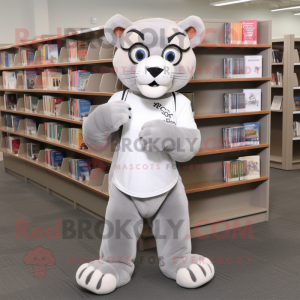 Gray Mountain Lion mascot costume character dressed with a Polo Shirt and Reading glasses