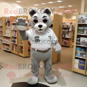 Gray Mountain Lion mascot costume character dressed with a Polo Shirt and Reading glasses