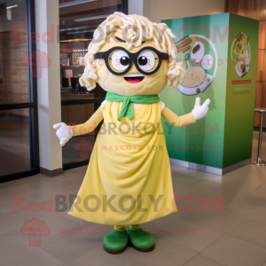 Cream Pesto Pasta mascot costume character dressed with a Shift Dress and Eyeglasses