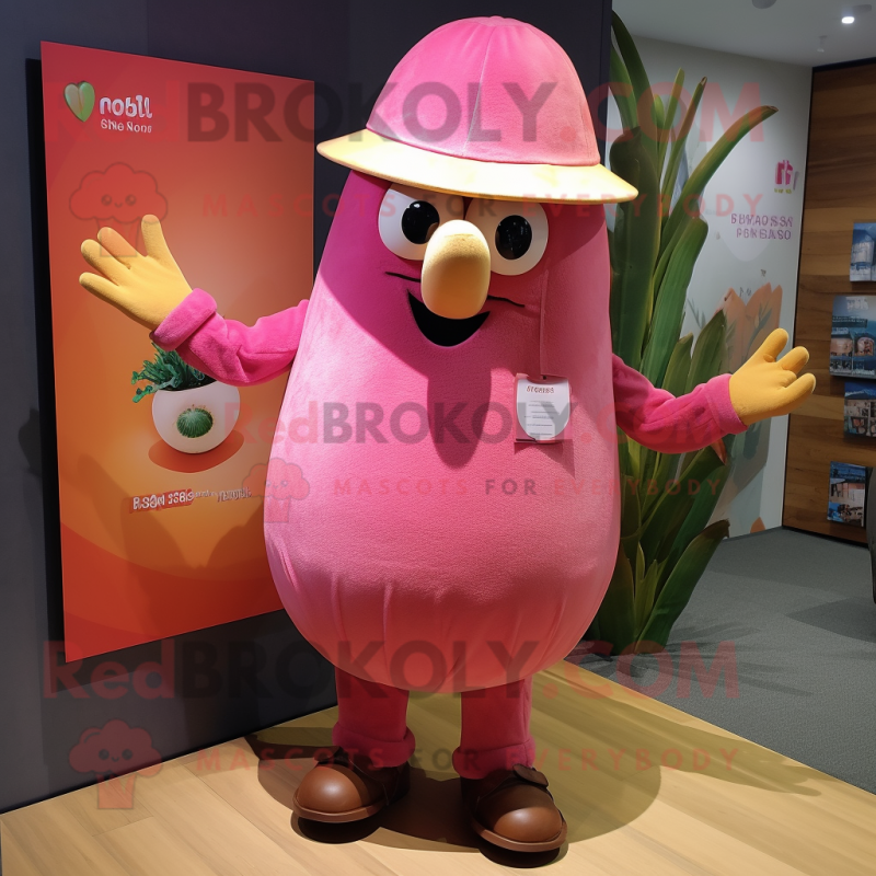 Pink Mango mascot costume character dressed with a Long Sleeve Tee and Hat pins Pink Mango mascot costume character dressed with a Long Sleeve Tee and Hat pins