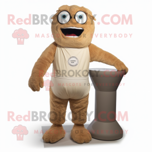 Tan Cyclops mascot costume character dressed with a Henley Tee and Ties